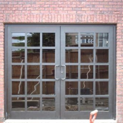 Manetta Inc, College Pt, NY, NY - Pair of Medium Style Dark Bronze Anodized Aluminum door divided to 15 lights