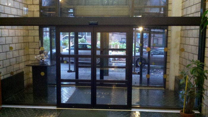 stainless steel clad storefront entrance Manhattan